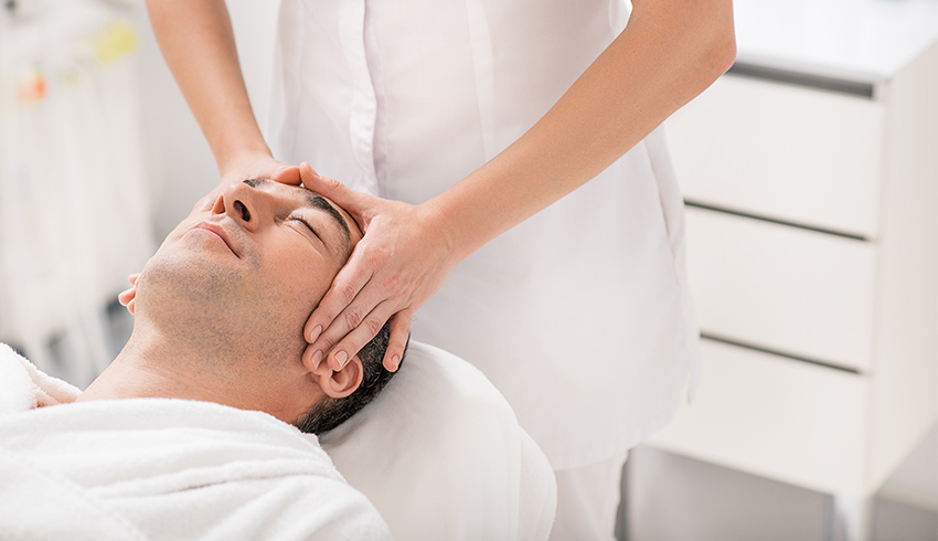 Man receiving a spa facial